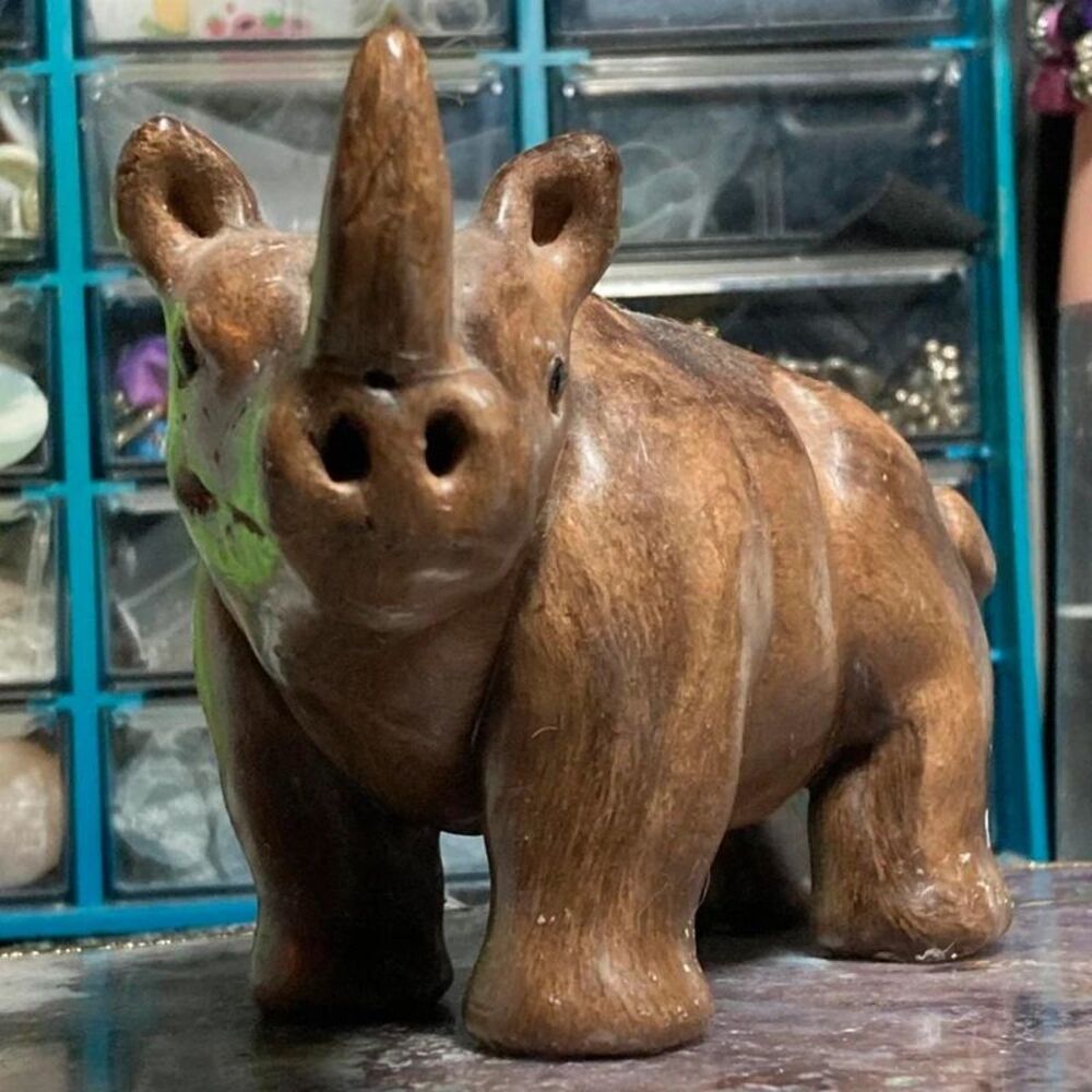 Hand carved brown rhino candle